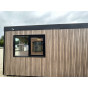 gebouw bekleed met kunststof vinyplus quattro paneel vergrijsd redcedar shadow
